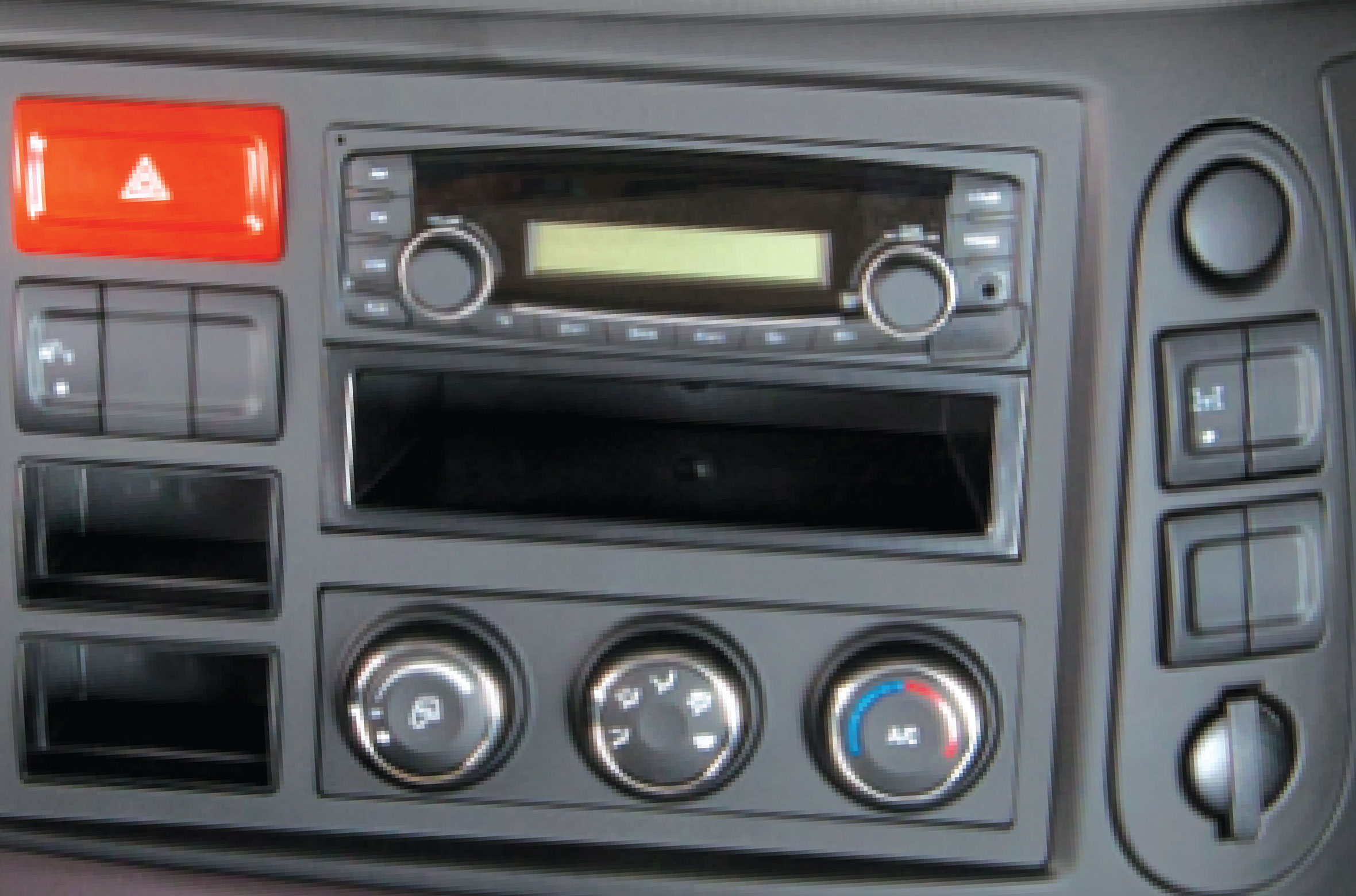 Radio, máy nghe nhạc và cụm điều khiển hệ thống điều hoà nhiệt độ